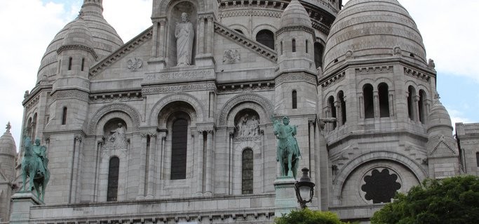 Climbing the steps to Sacre Coeur